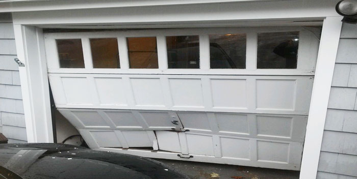 Busted garage door fixer Queens NY